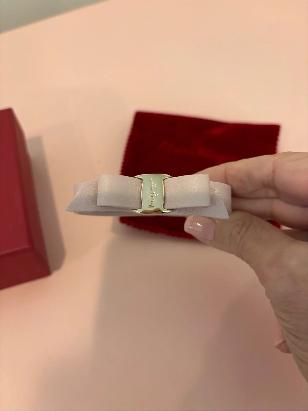 Salvatore Ferragamo Pale Pink Leather Vara Bow Bracelet with Gold Hardware